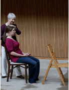 Joan Murray teaches the Alexander Technique to a student.