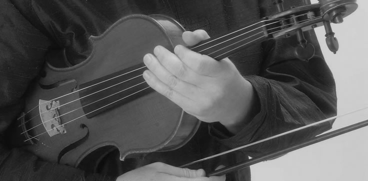 Alexander Technique student holding violin